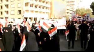 بالفيديو.. النساء تشارك في تظاهرات دعم الشرعية في بغداد