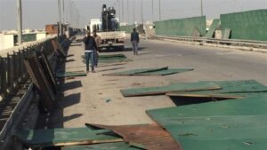 بالصور.. القوات الأمنية تغلق جسر الطابقين في بغداد
