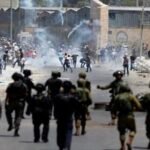 مواجهات بين فلسطينيين والقوات الاسرائيلية خلال اقتحامها قرية المغير في رام الله